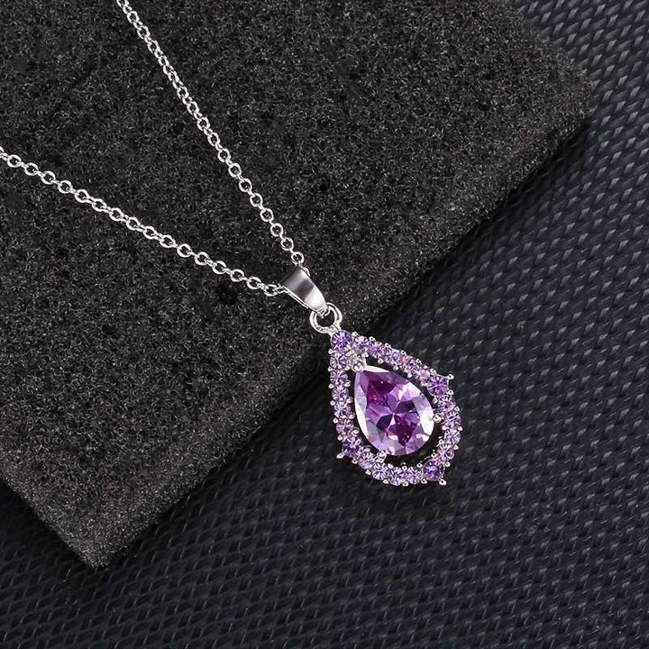 Ensemble collier et boucles d'oreilles en améthyste