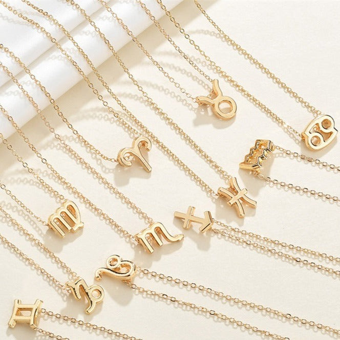 porte-clés Celestique en or avec votre signe astrologique