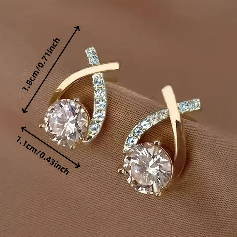 Boucles d'oreilles en or avec croix et zircon
