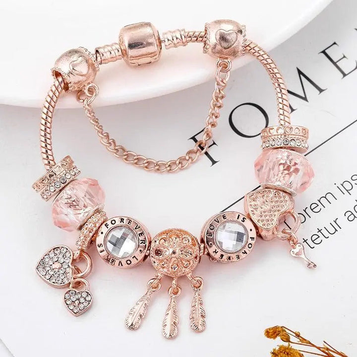 Bracelet Attrape-Rêves Rose avec Charms en Argent Sterling Inclus" can be rewritten as:

"Bracelet Rose Attrape-Rêves avec Charms en Argent Sterling