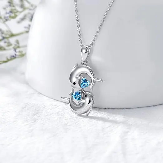 Collier en Argent avec Deux Dauphins et Pierre Cristal Bleue